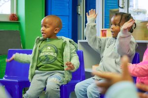 SACE 010 children engaged in song, rhymes, language activities